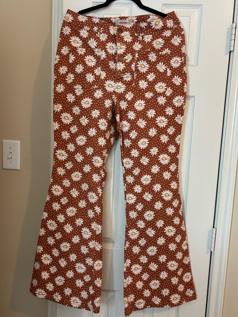 Wrangler Floral Daisy Flare Pants in Rust
